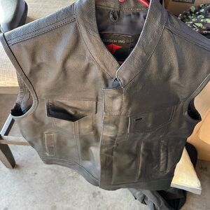 This is a MataGear black leather motorcycle riding jacket